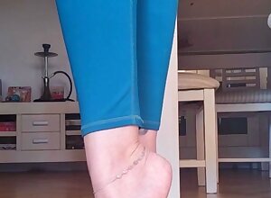 Cute teen girl enjoys foot fetish